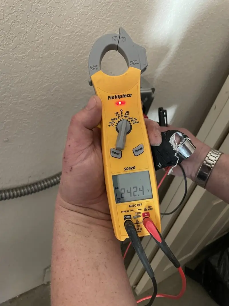 Voltage testing with clamp meter during Ceiling Fan Installation in Harrington Park